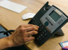 How to Find the Best Internal Telephone System Business Telephone - Person Dialing the Telephone