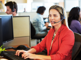 What are the Best Office Headsets for Call Centres, Receptions and Home Offices? Lady wearing a Jabra Biz 2400 Wired Office Headset
