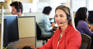 What are the Best Office Headsets for Call Centres, Receptions and Home Offices? Lady wearing a Jabra Biz 2400 Wired Office Headset