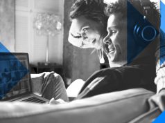 What is Bluetooth LE? Bluetooth LE Audio - Lifestyle image showing a couple watching media on a laptop together.
