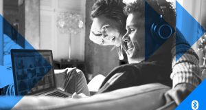 What is Bluetooth LE? Bluetooth LE Audio - Lifestyle image showing a couple watching media on a laptop together.